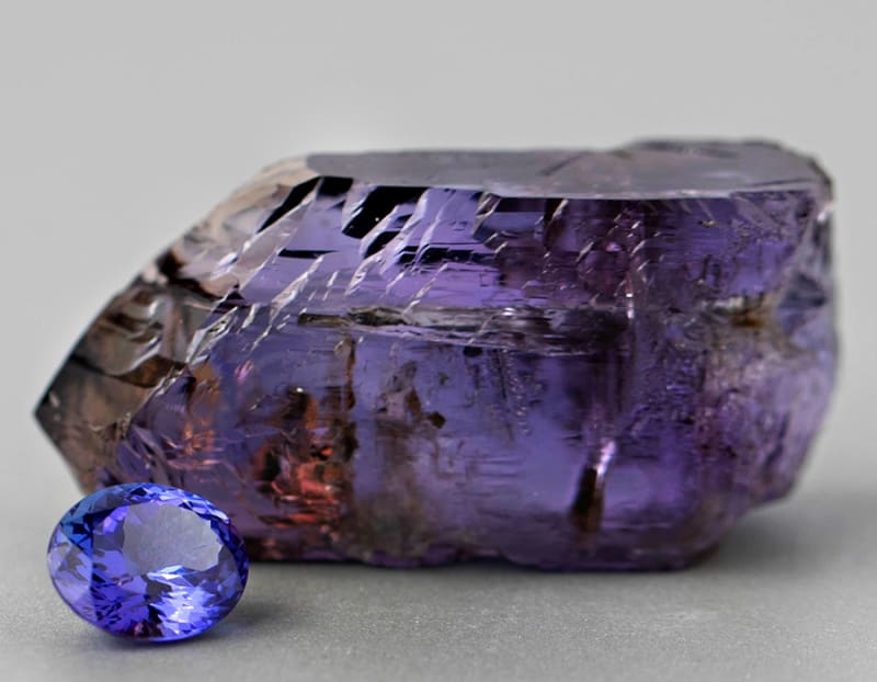 This is a close up shot of a blue, heirloom tanzanite stone. 