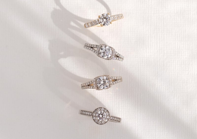 Four lab-grown white diamond rings. 