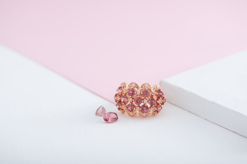 A pink garnet ring and pink garnet gemstones 
