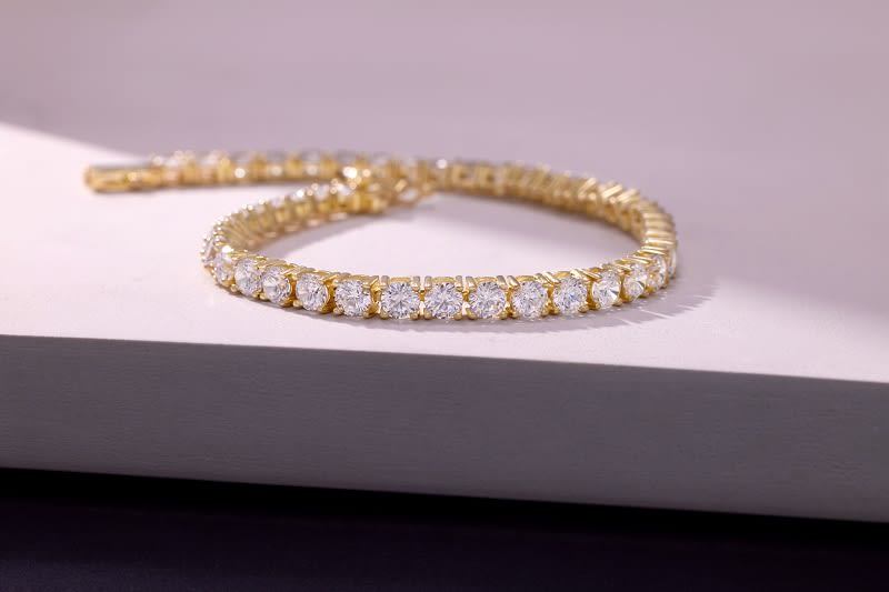 a bella luce white gemstone and gold tennis bracelet 