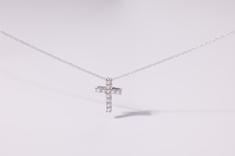 a prazana lab-grown diamond cross and silver pendant 