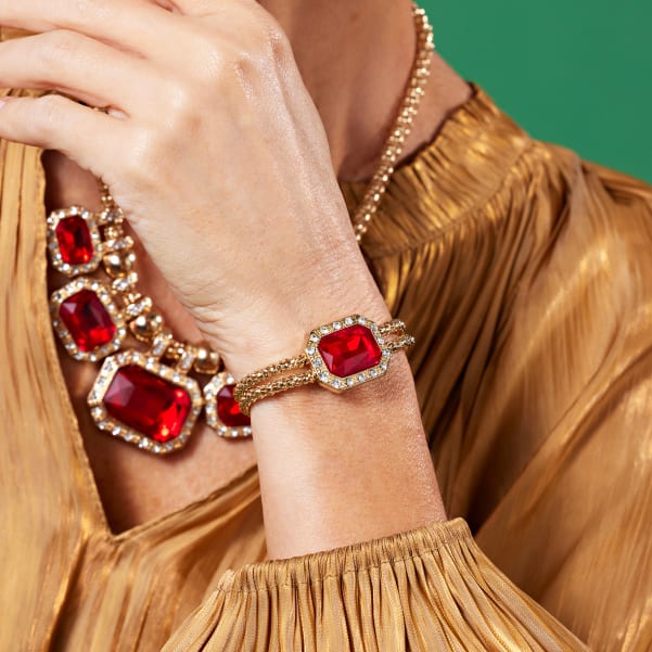 Woman wearing red jewelry
