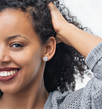 Woman wearing stud earrings