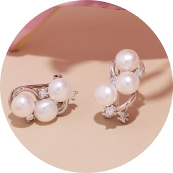 three pearls on silver earrings