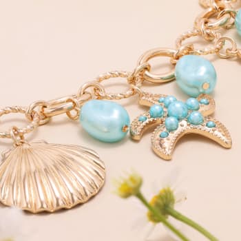 charm bracelet with beach charms, seashell, starfish 
