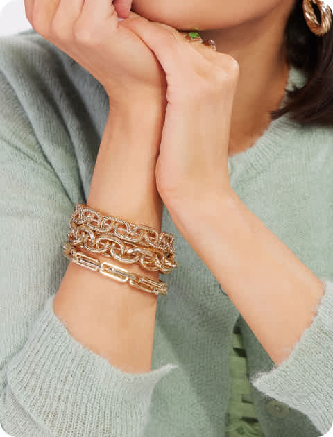 Woman wearing stackable bracelets
