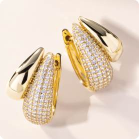 yellow gold earrings with white stones