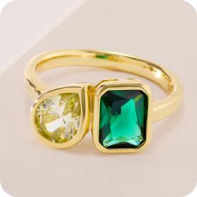 yellow gold two stone ring green and yellow stones