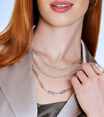 woman wearing solid silver jewelry 