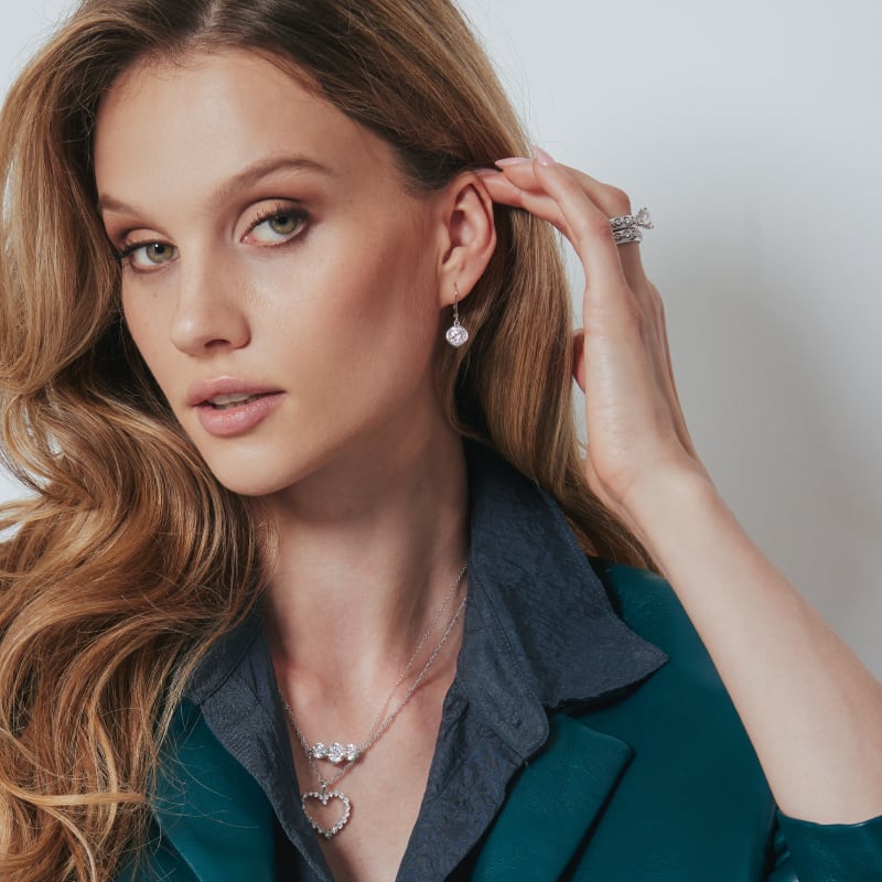 woman wearing moissanite fire jewelry 
