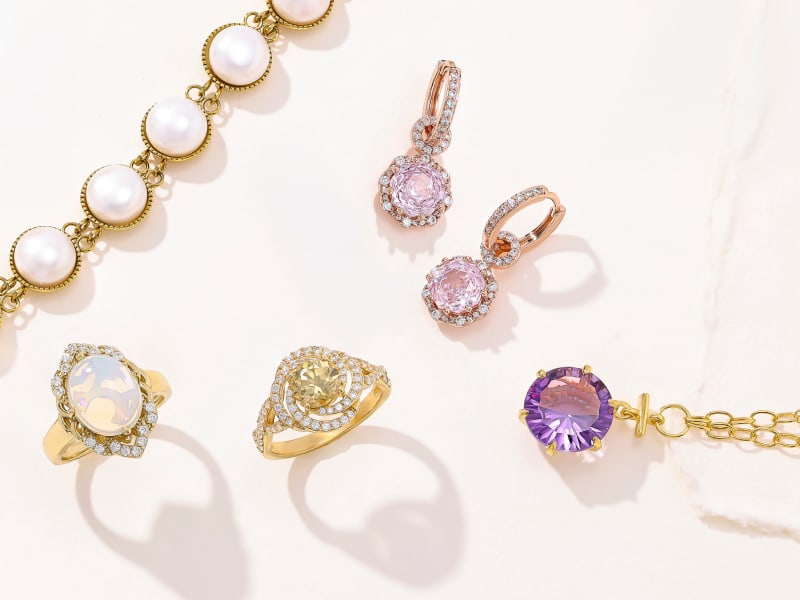 multiple jewelry items rings, earrings, necklace and bracelet 