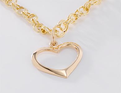 Gold heart charm