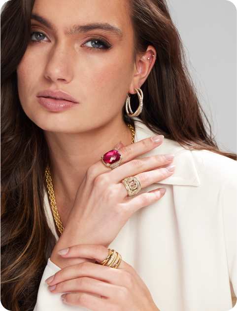 woman wearing multiple earrings 