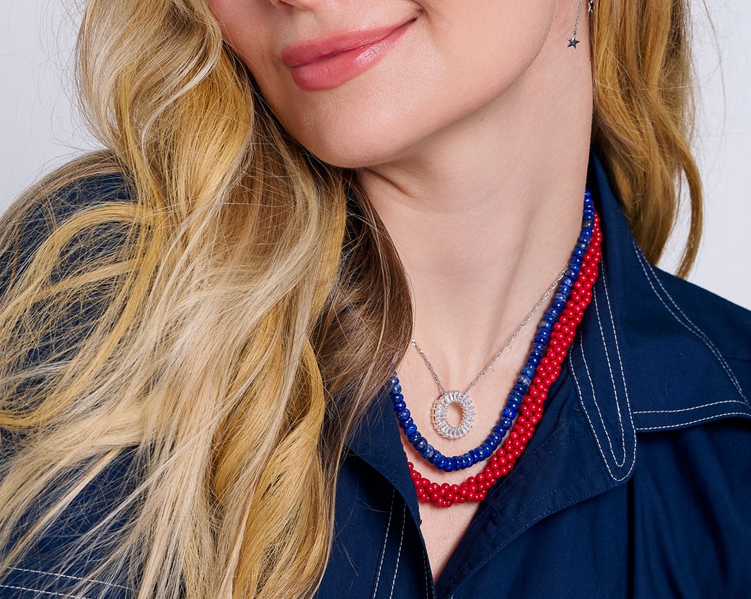 woman red and blue beaded jewelry 
