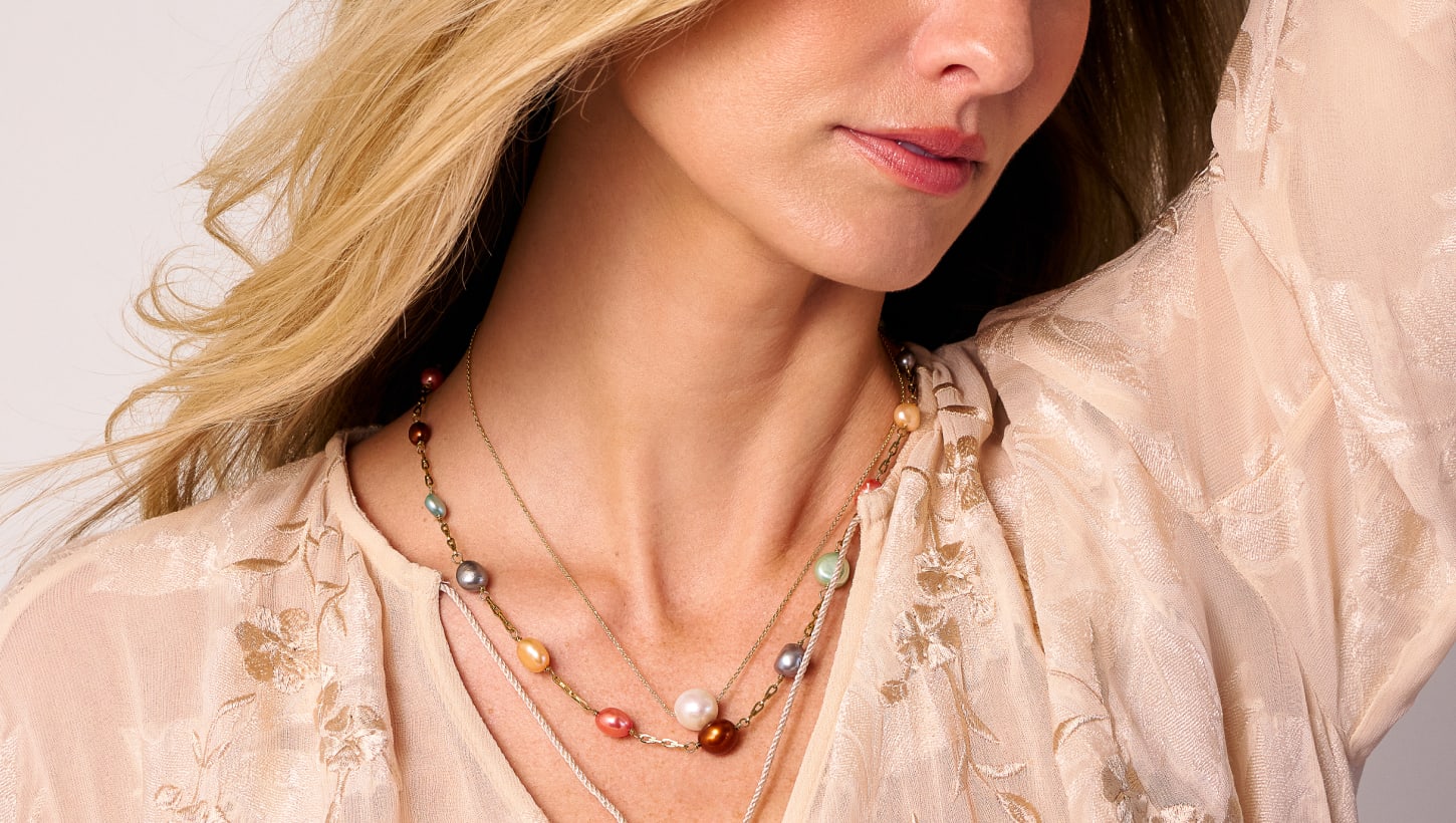 woman wearing pearl jewelry 