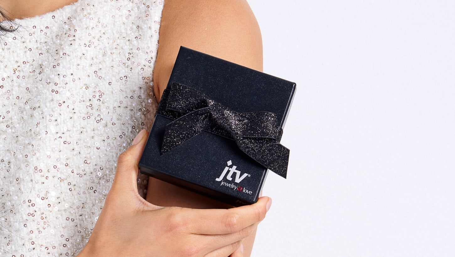 woman holding gift bag