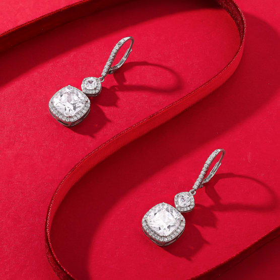 gold hoop earrings with white stones