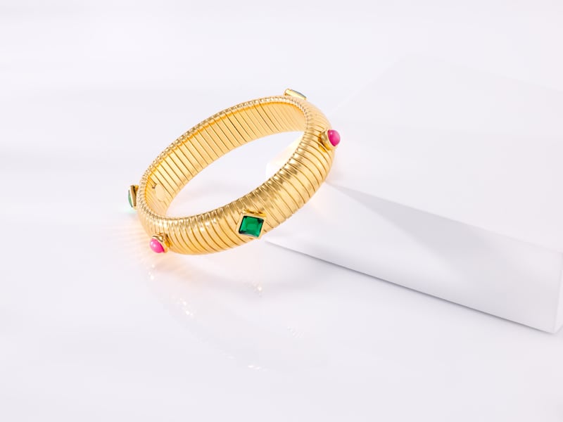 Rachel Zoe gold ring with different colored gemstones 