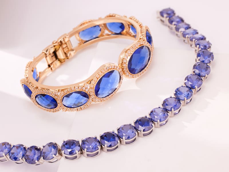 two bold and blue gemstone metal bracelets 