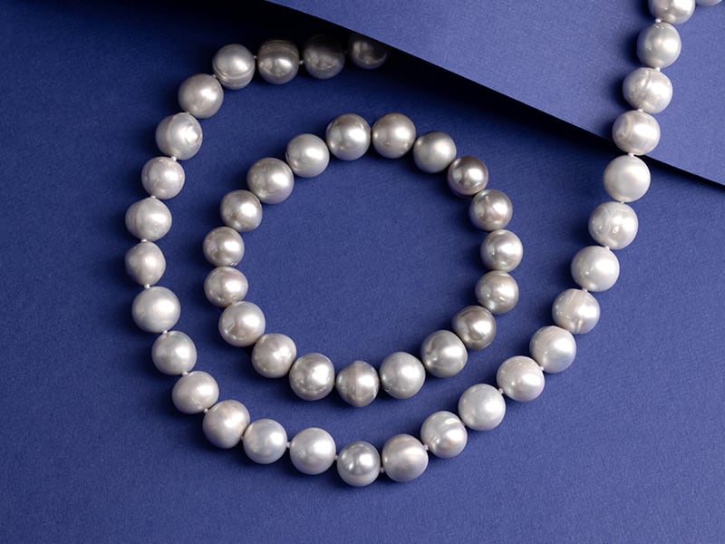 a silver pearl strand necklace 