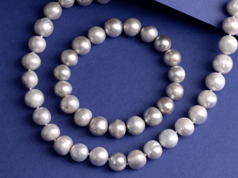 a silver multi-pearl necklace 