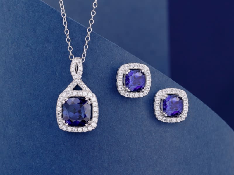 silver, blue sapphire stud earrings and necklace 