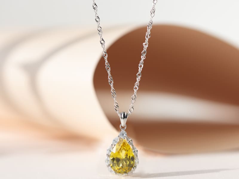 Lab created yellow sapphire and white cubic zirconia pendant with chain 