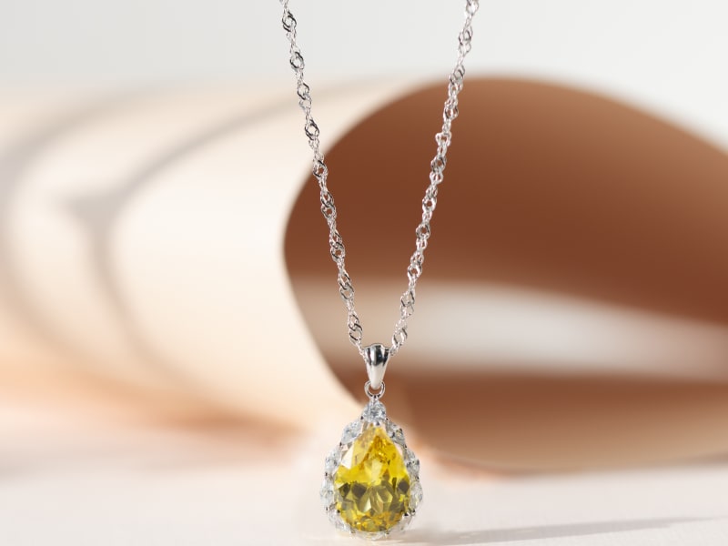 Lab created yellow sapphire and white cubic zirconia pendant with chain 