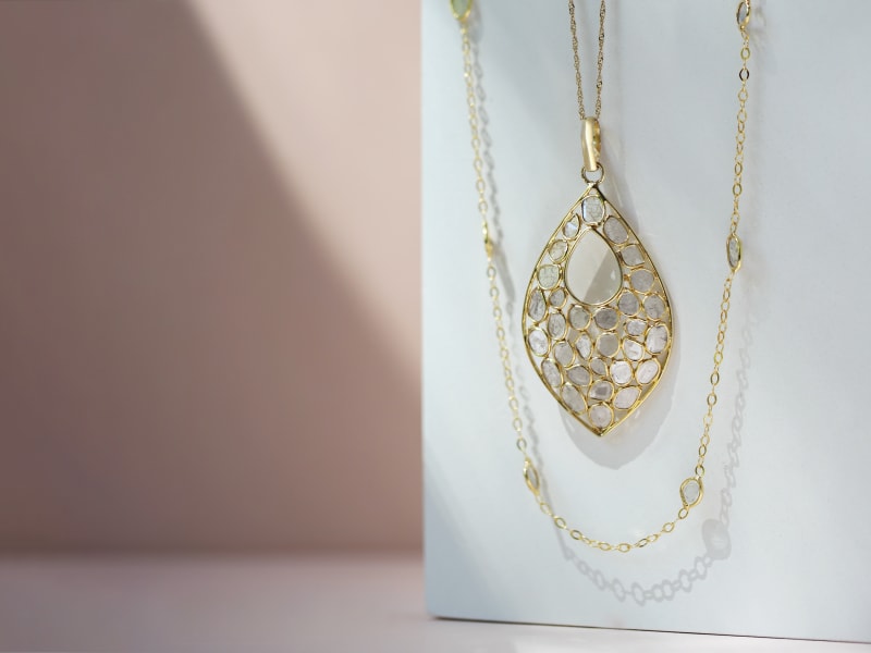 A Polki diamond and gold pendant and chain necklace 