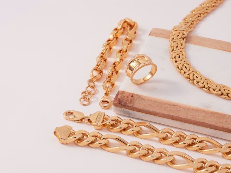 Gold jewelry including necklaces, a ring and a bracelet 