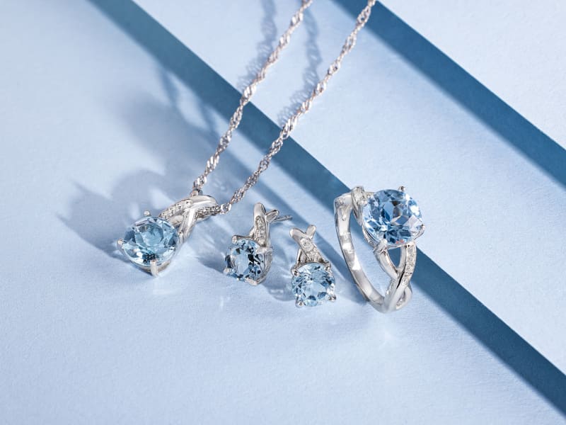 Sky Blue Topaz Rhodium Over Silver Ring, Earrings, and Pendant Set 