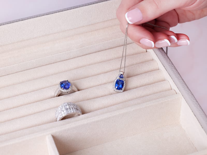 tanzanite jewelry stored in velvet-lined jewelry storage 