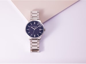 a blue and metallic link watch 